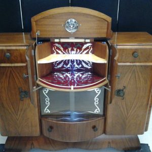 Pop-Up Sideboard/Bar of Walnut with Red Mirrored Bar Service